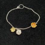 Bracelet sonore « Conter fleurette » en argent et émaux