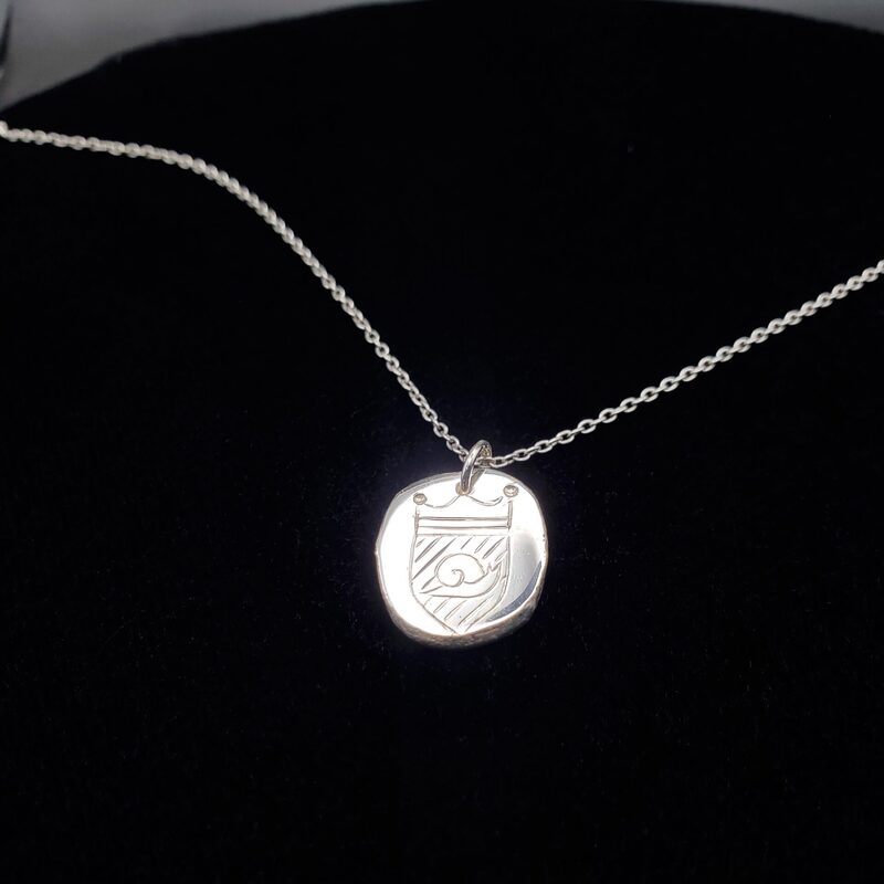 Médaillon héraldique en argent massif au blason d’escargot